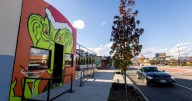 Grinch mural lights up Fanboy’s holiday pop
