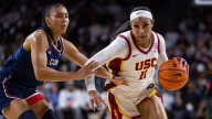 Azzi Fudd leads No. 1 UConn's 79-51 rout of 16th-ranked USC with JuJu Watkins looking on