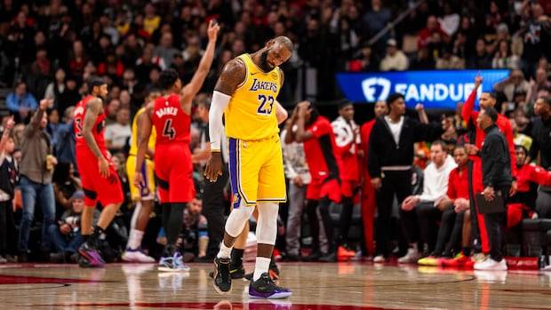 LeBron James's historic 1,297-game streak of double-digit scoring ends as Lakers top Raptors