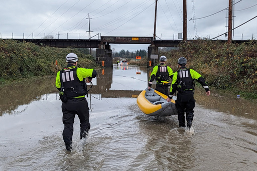 Storms bring heavy rain to the Pacific Northwest, snow and freezing rain to the Upper Midwest