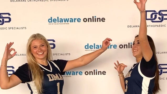 Player handshakes at Delaware Online High School Basketball Media Day