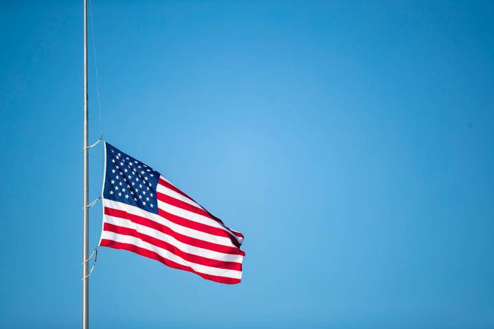 Why flags are half-staff in two states today