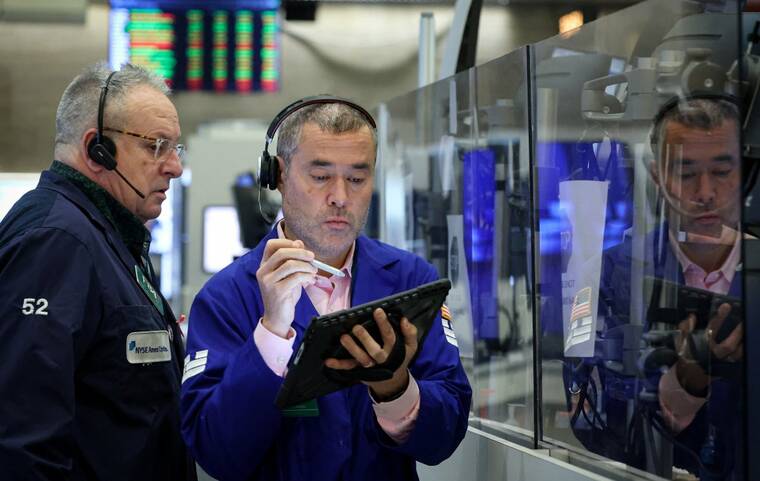 Stocks end lower as investors wait for Fed rate decision