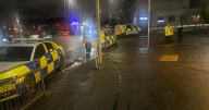Glasgow street cordoned off after man found injured as police pictured at scene