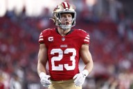 49ers' Christian McCaffrey likely to play through minor back injury vs. Titans: Source