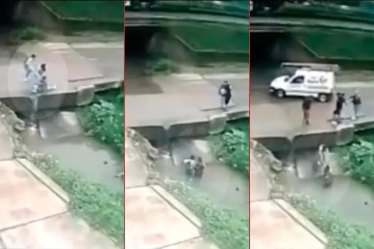 Video: madre e hija cayeron a un zanjón al resbalar en un badén sin medidas de seguridad