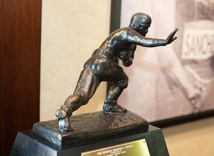 Mendoza, Love Named Finalists for Heisman Trophy