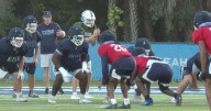 Keiser University football pushes for title while coach battles medical emergency