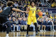 Michigan point guard sets the tone again, controls game at both ends