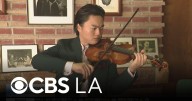 Violinist shows off his talent while playing a historic instrument