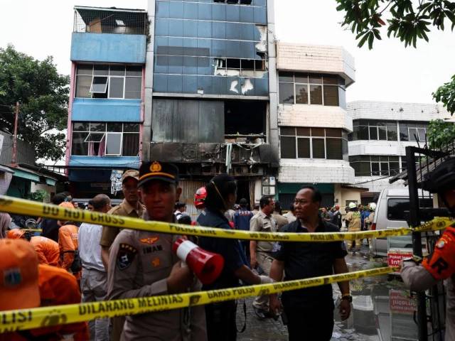 At least 22 killed as fire engulfs seven-storey office block in Jakarta