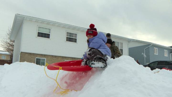 A heap of snow in Gander means a day of fun for kids