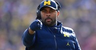 Ex-Michigan coach Sherrone Moore charged with stalking