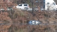 Car careens into Passaic River during three