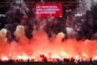 Ajax match abandoned in the sixth minute after fans set off fireworks