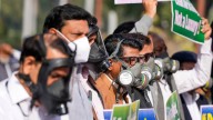 Opposition MPs protest outside Parliament over rising air pollution in Delhi