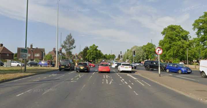 Major road blocked after car flips onto its roof and woman taken to hospital