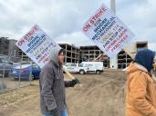 Plumbers on strike at mixed-use development site in Muskegon