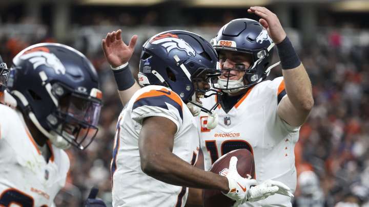 Broncos lead Raiders 14-7 at halftime
