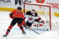 Glass helps Devils break through, downing Sens to end five