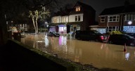 Greater Manchester road floods AGAIN less than three months after last becoming submerged