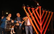Menorah lights the night at the Seal Beach Pier ahead of Hanukkah