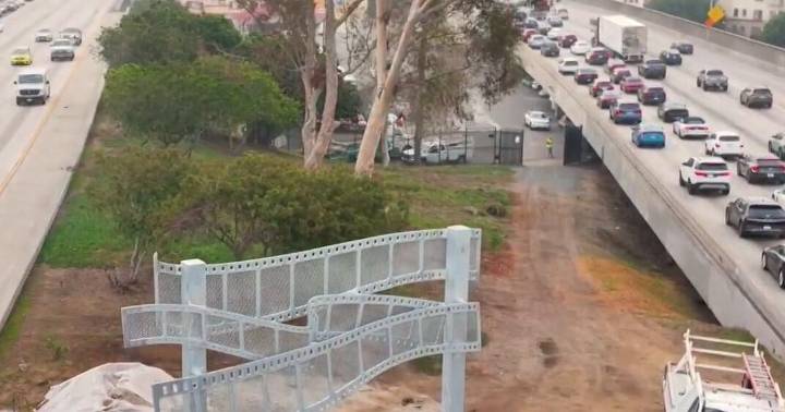 Filmstrip sculpture rises along the East Hollywood 101 Freeway
