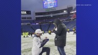 Bills fans celebrate with a postgame engagement at Highmark Stadium