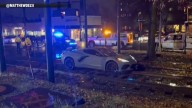 Service disrupted after sports car gets stuck on Green Line tracks in Brookline