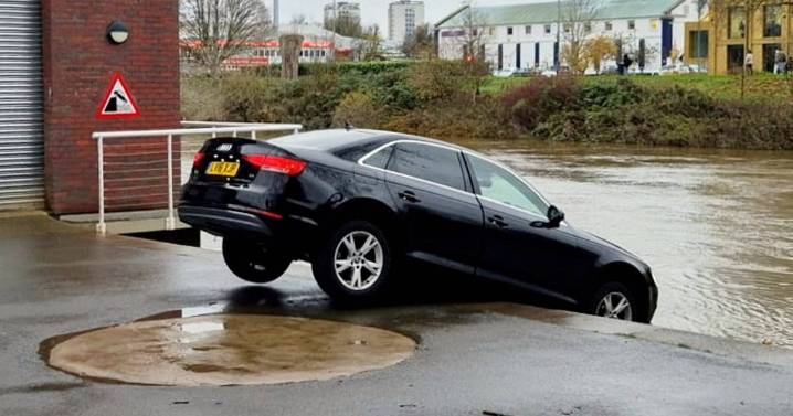 'Can't park there mate' - £40k Audi teeters on edge of river as handbrake fails