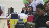 Program allows Atlanta elementary students to earn points to spend on holiday gifts for their loved ones