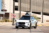 Waymo will recall software after its self-driving cars passed stopped school buses – Houston Public Media