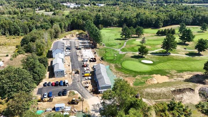 Townhomes overlooking Rochester Country Club priced under $300K