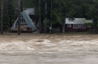 Washington residents face dire flood conditions along swelling rivers