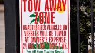Is it legal to have a car towed from blocking my driveway in Florida?