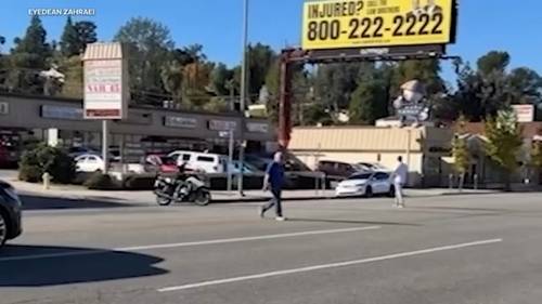 Viral video of Los Angeles police operation involving jaywalking pedestrians along busy Ventura Boulevard sparks debate online