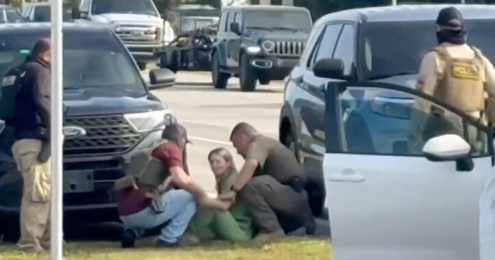 Video shows federal agents pulling Florida woman from car as she screams "I'm a U.S. citizen"
