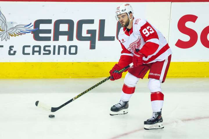 Wings build 4-goal cushion, hang on to edge Flames - The Rink Live | Coverage of youth, junior, high school and college hockey