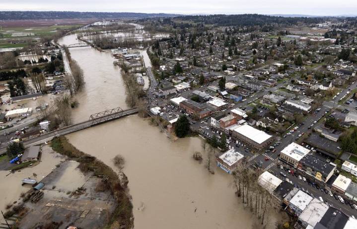 As storm recedes, roads remain closed and buses still run