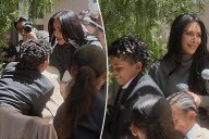 Kim Kardashian sons fight on stage during her law school graduation party
