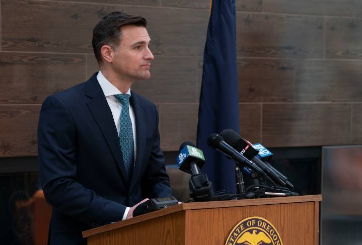 Oregon, other states sue Trump administration over $100K H