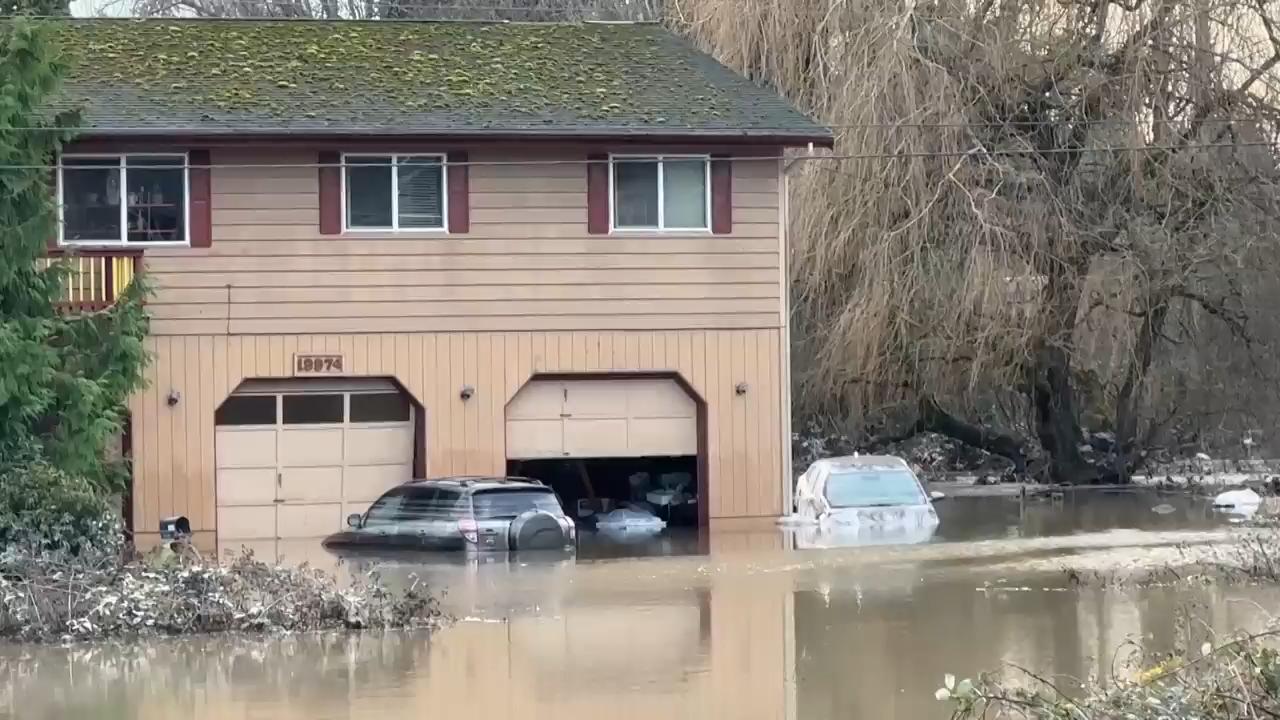 Residents clean up, assess damage after waters recede from Washington state flooding