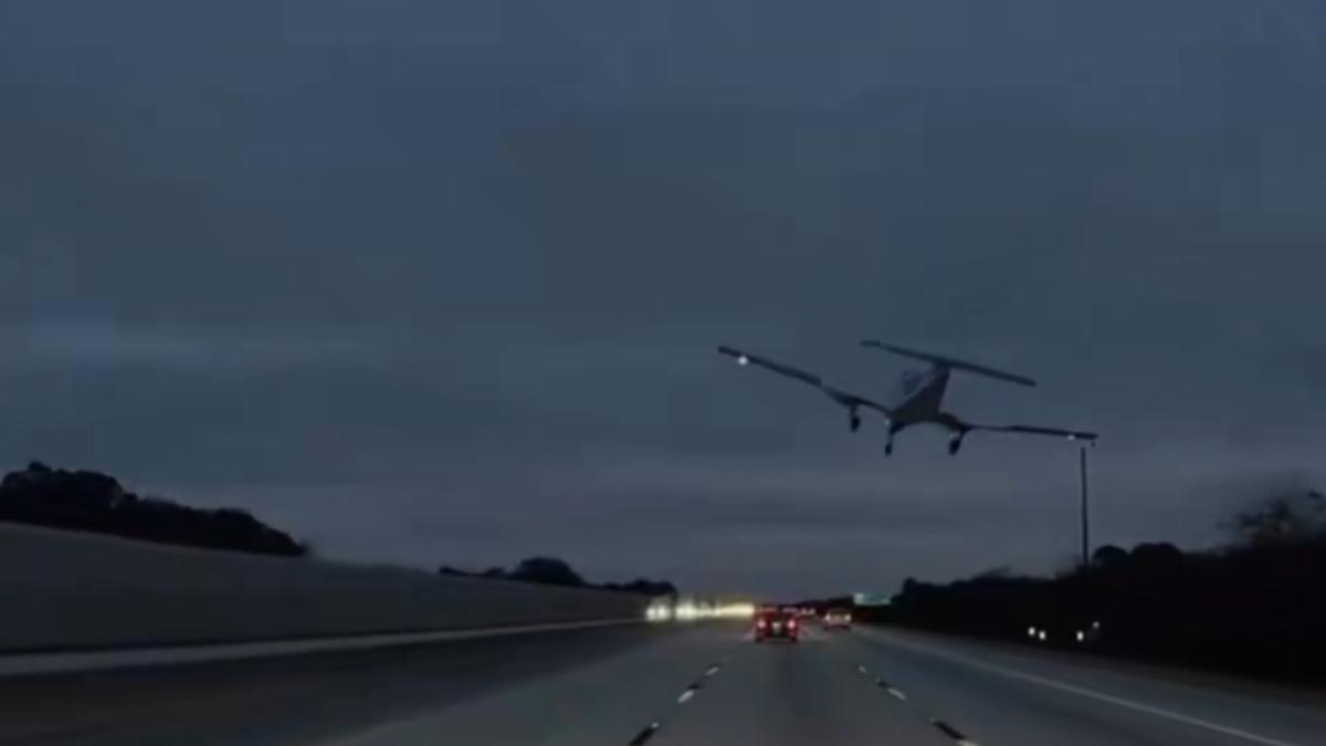 Small plane falls from sky onto Florida freeway, skids over car