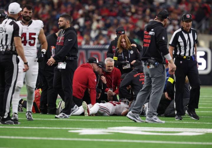 Cardinals WR Andre Baccellia taken to hospital with neck injury