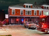 Syracuse coffee shop damaged after fire in upstairs apartment