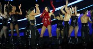 Dua Lipa's Red Bodysuit Has Just Two Belts Holding It Up