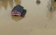 Heavy rains unleash major flooding, evacuations in Pacific Northwest