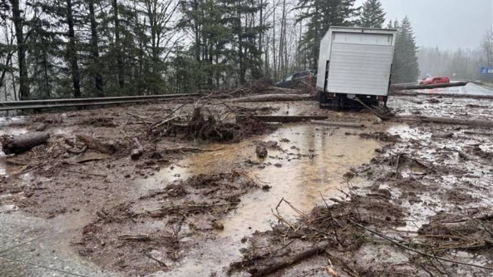 Historic rainfall eases, but landslide threat lingers