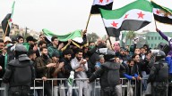 Syrians gather to mark one year since the fall of the Assad regime