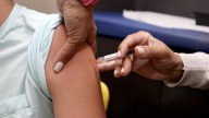CDC's vaccine advisers meet to question long